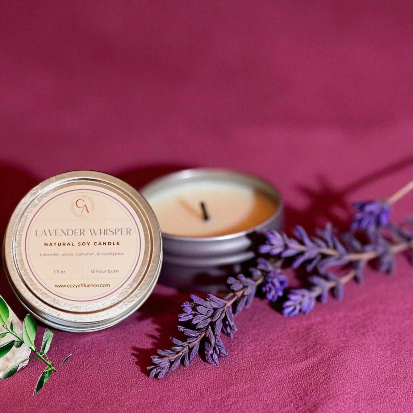 Lavender Whisper natural soy candle surrounded by lavender sprigs on a purple background.