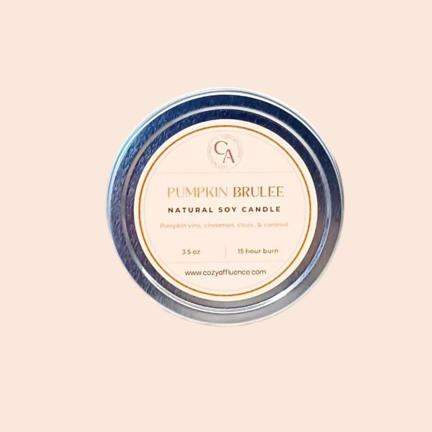 Pumpkin Brulee candle packaging with 'CA' logo on a beige background