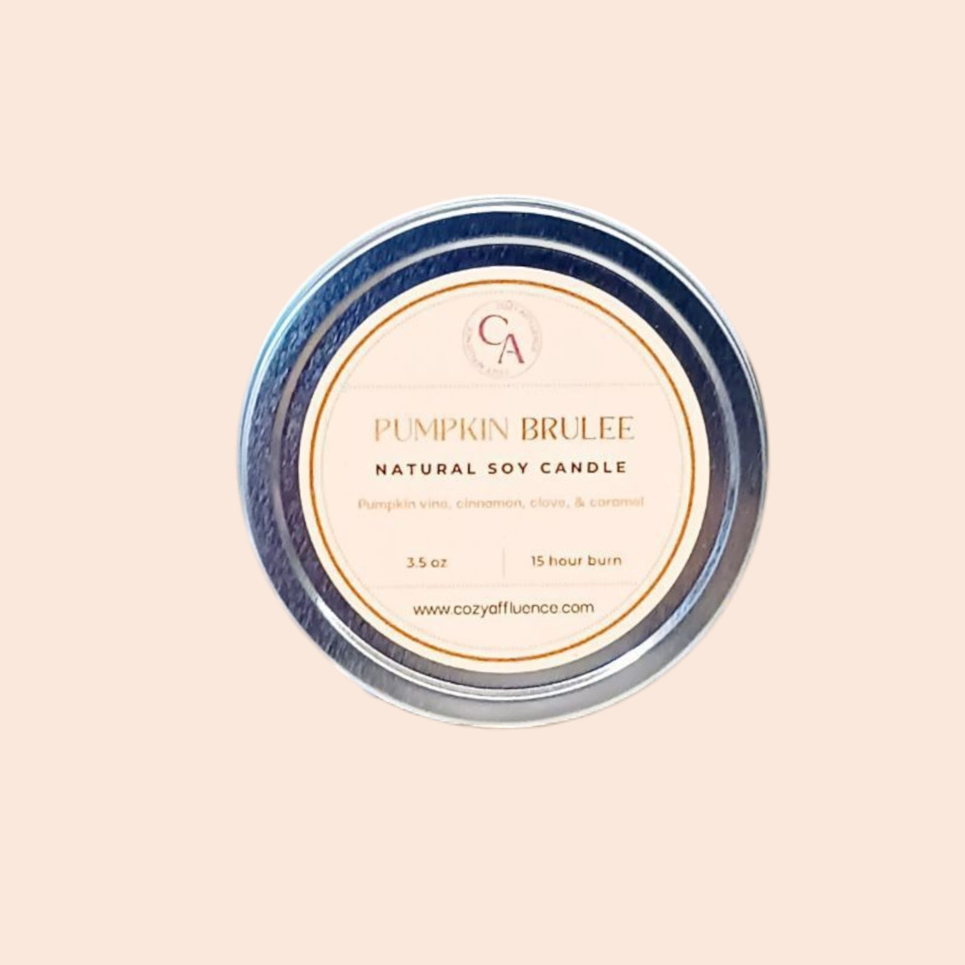 Pumpkin Brulee candle packaging with 'CA' logo on a beige background