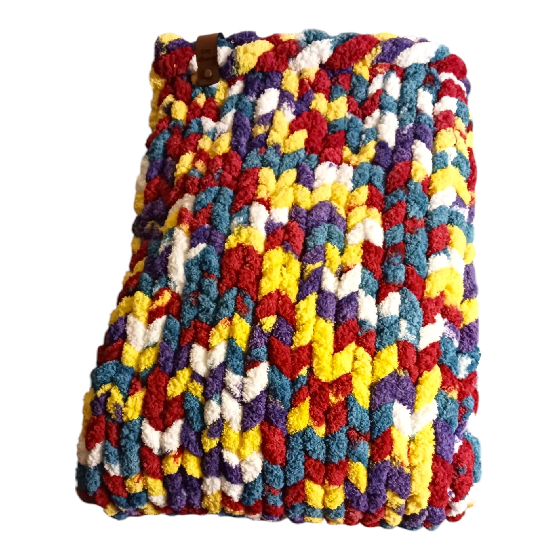 Folded watercolor chunky knit blanket.