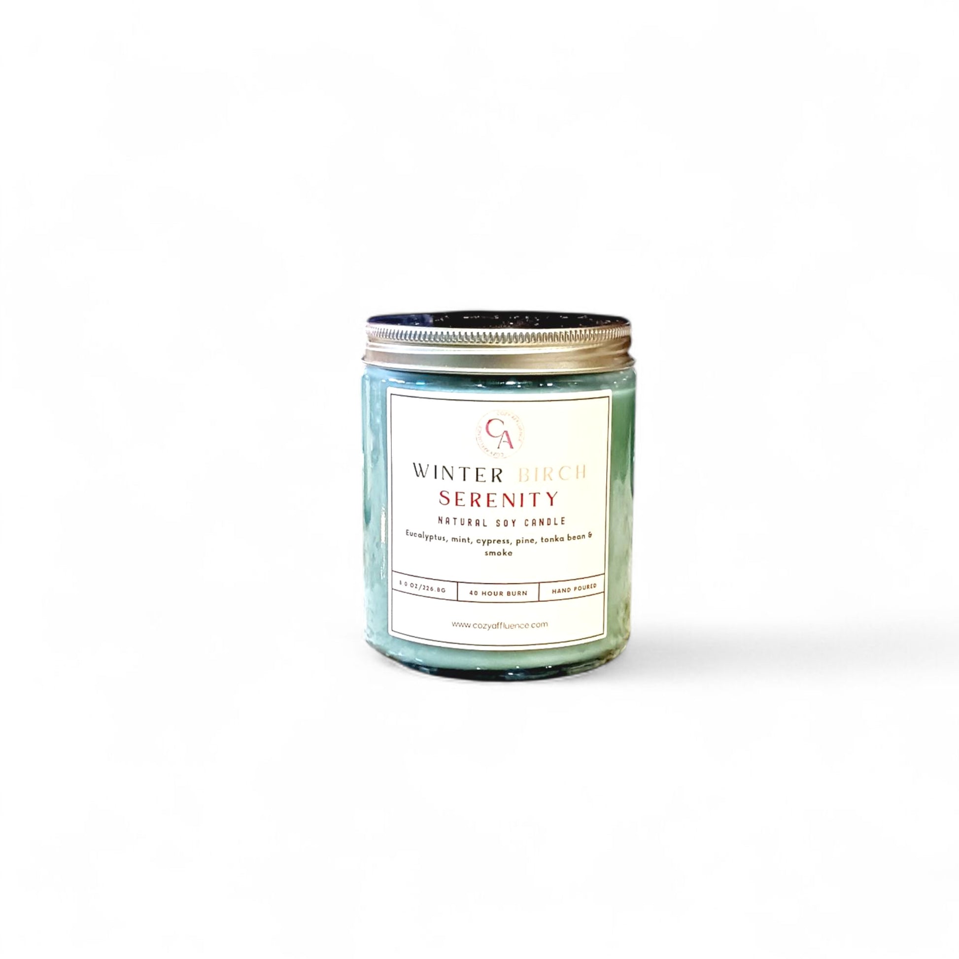 Candle labeled 'Winter Serenity' with a white background
