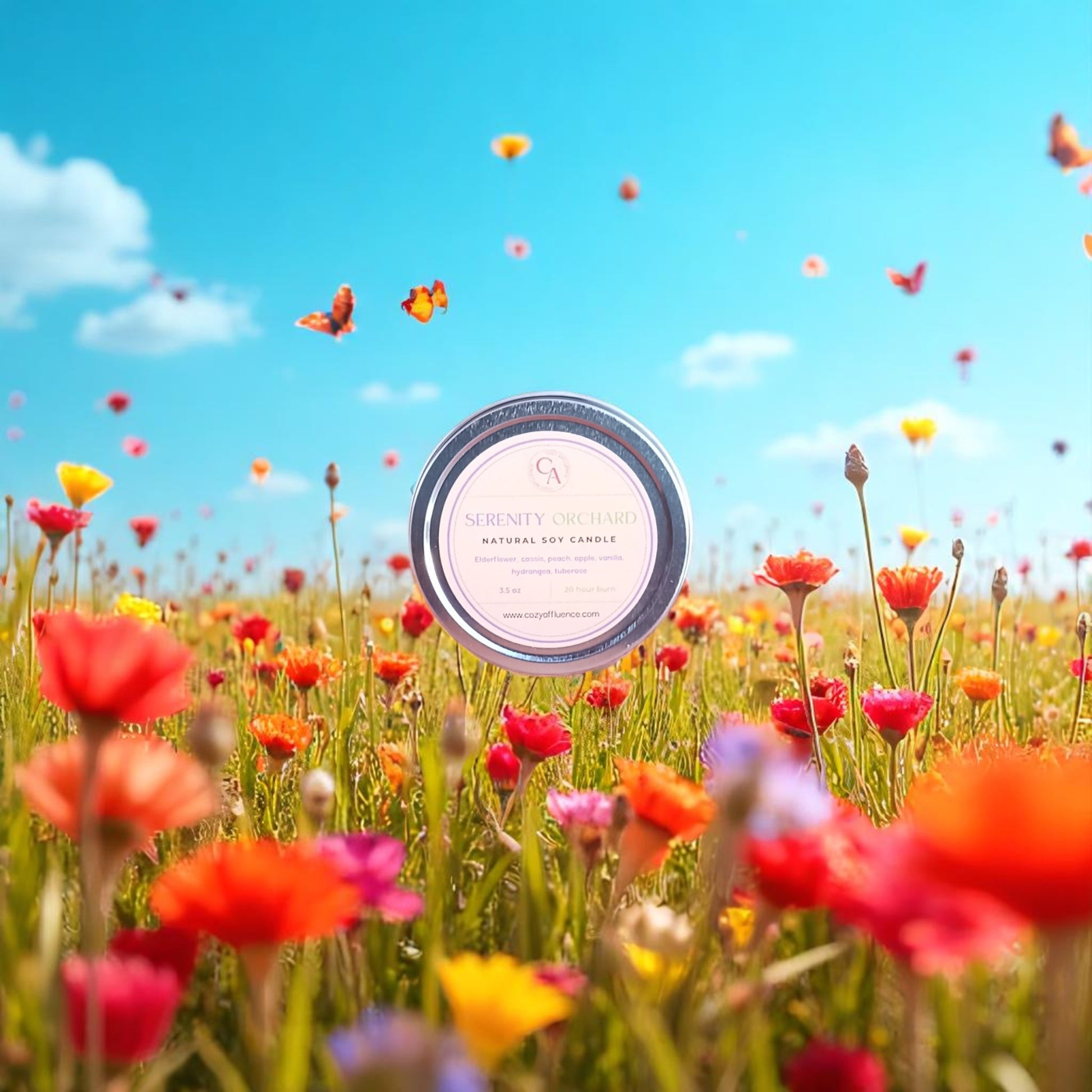 
A "Serenity Orchard" candle is levitating over a vibrant field of colorful wildflowers under a bright blue sky with fluffy clouds and butterflies.