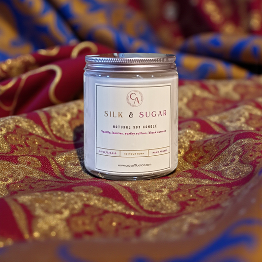 Silk & Sugar candle on a decorative fabric background